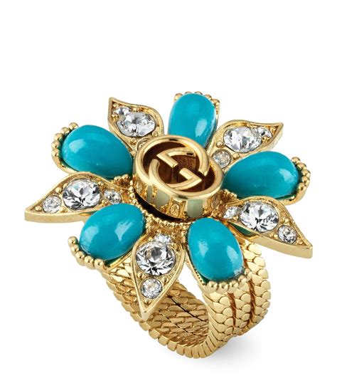 gucci flower tuquise ring.